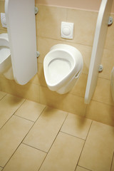 Public WC toilet. Clean public toilet with different accessories.
