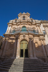 Fototapeta na wymiar Undulating facade of the Church of San John the Evangelist (Chiesa di San Giovanni Evangelista) in Scicli