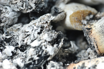 Cigarette ashes. Closeup details of cigarette ashes in the ashtray.