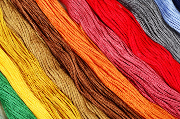 Multi-colored cotton threads for the background