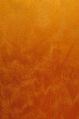 Abstract wall wallpaper with gradient orange colors.
