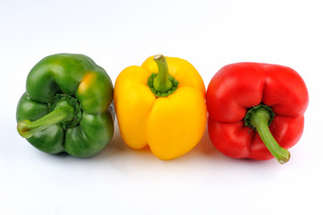 Capsicum. Group of three capsicum isolated on the white background.