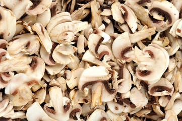 Mushrooms wallpaper. Closeup white mushrooms in the market stall. 