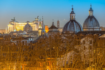 Fototapeta na wymiar Rome at sunset time with St Peter Cathedral