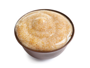 Bowl with natural scrub on white background
