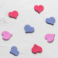 group of multi-colored hearts on white hand drawn background. Close-up