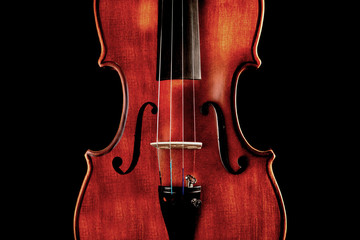 Photo of a violin on a black background