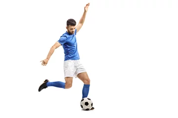Foto auf Acrylglas Soccer player kicking a football © Ljupco Smokovski