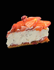 slice of cake with cream and strawberries on a black background