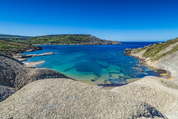 Fototapeta na wymiar Spiaggia della baia di Qarraba, Malta 