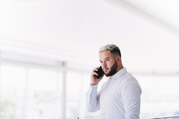 Young Businessman Talking On Phone