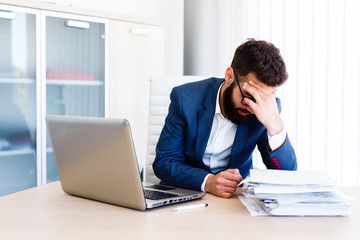 Naklejka premium Young Handsome Businessman Has Headache