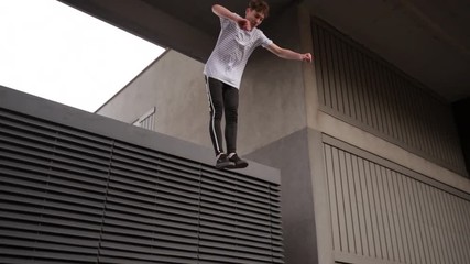Freerunner on the Rooftops - Powered by Adobe