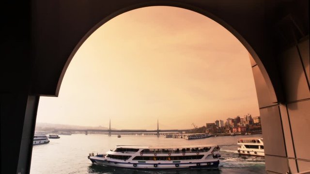 Goldenhorn Metro Bridge from Galata Bridge in Istanbul, Turkey. Galata Bridge a 490 m long bascule bridge spans the Golden Horn and connects Galata region to Old City. 4K, Ultra Wide angle