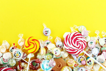 candies with jelly and sugar. colorful array of different childs sweets and treats.