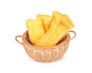 crispy butter bread with sugar in rattan basket on white background