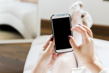 Hands using a smart phone