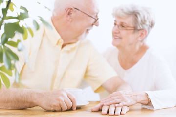 Couple holding hands