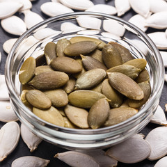 pumpkin seed oil on a rustic background
