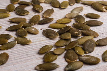 pumpkin seed oil on a rustic background