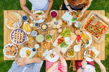 People eating italian dinner at table