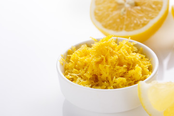 Lemon and juice on a white background