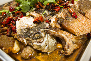 Fototapeta na wymiar Chinese delicacies — Grilled fish
