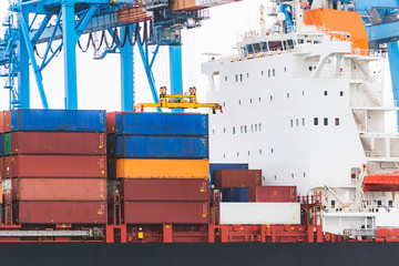 Merchant ship with container is unloaded in the port of Genoa (IT)