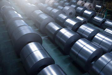 Cold rolled steel coil at storage area in steel industry plant. - obrazy, fototapety, plakaty