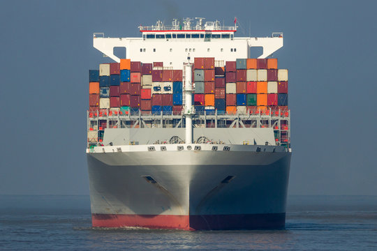 front view of a cargo shipping sea container ship