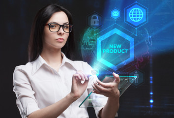 The concept of business, technology, the Internet and the network. A young entrepreneur working on a virtual screen of the future and sees the inscription: New product