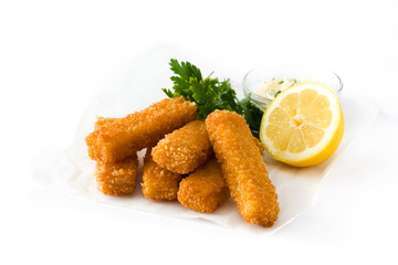 crispy fried fish fingers with lemon and sauce isolated on white background