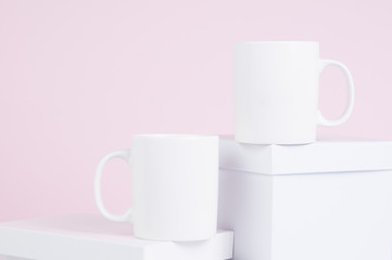 two blank white coffee mug mock ups