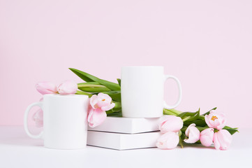 two blank white coffee mug mock ups