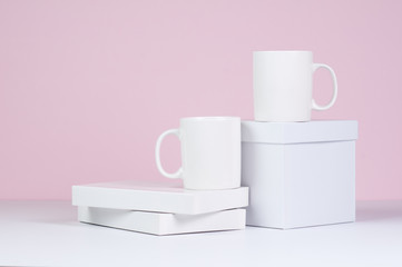 two blank white coffee mug mock ups
