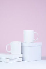 two blank white coffee mug mock ups