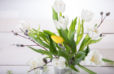Festive flower white tulips composition on white wooden desk, background. Overhead top view, flat lay. Copy space. Birthday, Mother's, Valentines, Women's, Wedding Day concept.