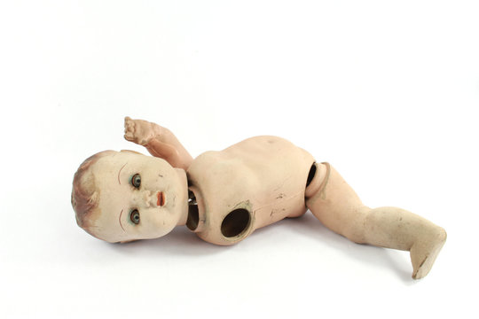 Close Up and Isolated Vintage Antique Old Doll