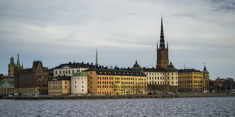 Fototapeta premium Buildings at waterfront, Gamla Stan, Stockholm, Sweden
