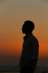 Silhouette of man at sunset