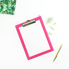 Clipboard with blank paper, notebook and pencil on white background. Home office desk mock up. Flat lay, top view.