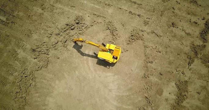  drone with camera flying to digger machine 3