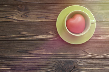 red heart in a green mug. favourite drink.