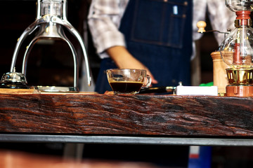 Makeing prepares coffee