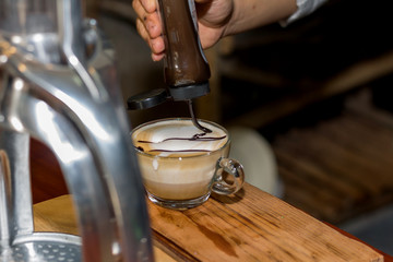 Makeing prepares coffee