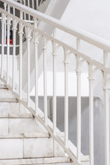 Beautiful Marble staircase with white railing leading upwards