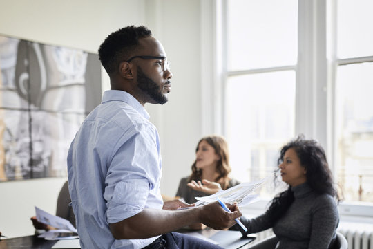 Business People Talking And Thinking