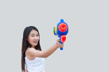 Asian sexy woman with water in hand on white background,Festival songkran day at thailand,The best of festival of thai,Land of  smile