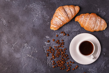 Breakfast with fresh croissants, orange juice and coffee.