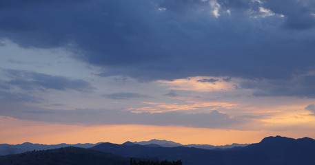 Fototapeta na wymiar Sunset above Ridge mountains panoramaic landscape . Sunrise over nature background. Lovcen, Montenegro